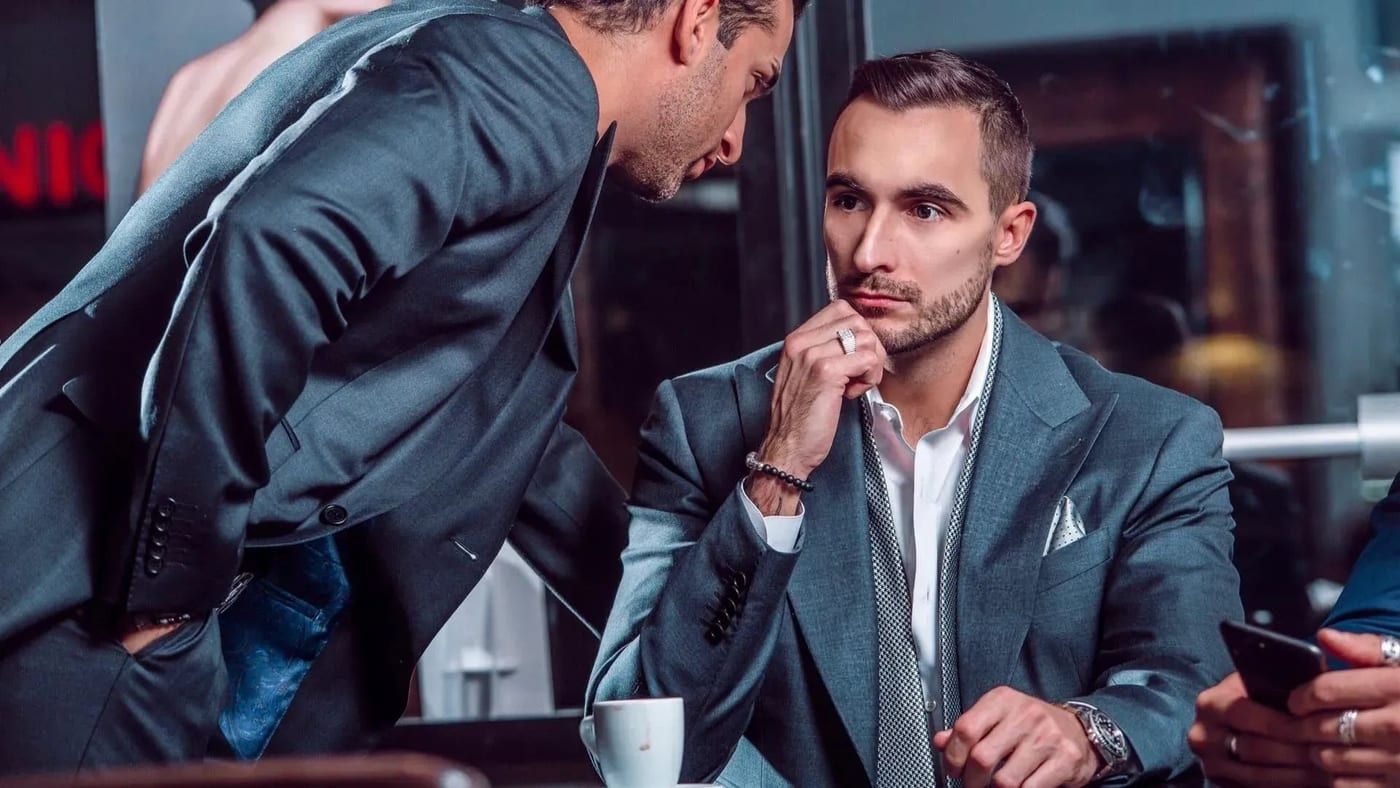 Executives in Conxeppt custom business suits